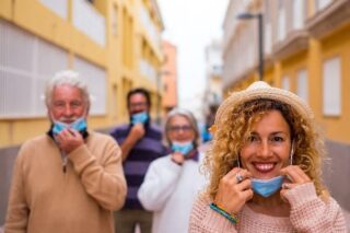 Group of people unmasking, COVID-19